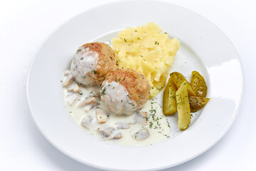 meatballs with mashed potato and sauce