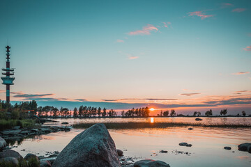 evening lighthouse by the gulf of finland, russia