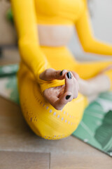 Yoga woman practicing yoga breathing lesson, meditation. Health concept. Yoga, sports.