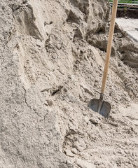 Shovel metal with sand, working tool.