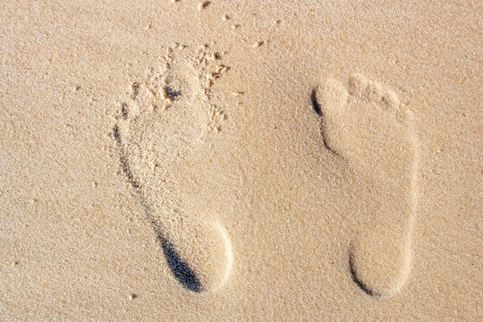footprint in the sand at Copacabana beach.