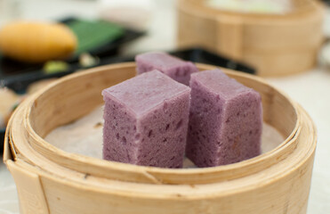 Taro steam cake in a bamboo steamer