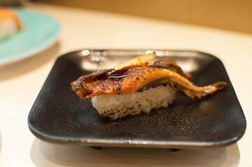 A tasty dish of eel sushi in a Japanese restaurant
