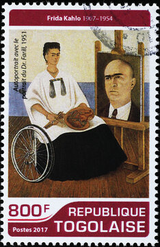 Self-portrait by Frida Kahlo on a wheelchair on stamp