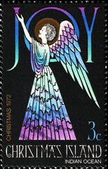 Angel wishing joy on postage stamp