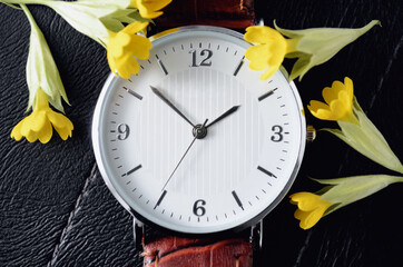 Wrist watch on a black background, for a gift