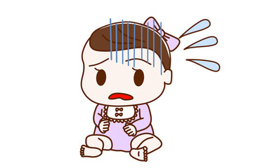 慌てるお座りの女の子の赤ちゃん