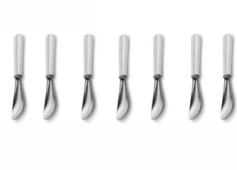 seven vertically kept silver metal cooking spatula isolated on a white background