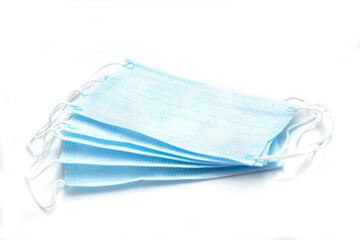 Blue surgical masks on white background