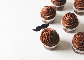 Chocolate cacao cupcakes with moustache, fathers day concept