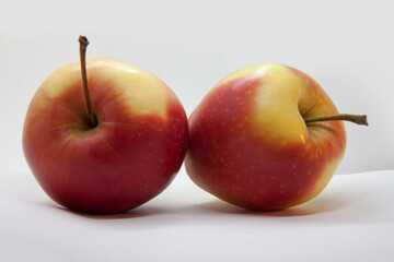Beautiful ripe apples close-up isolated on a white background