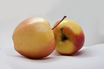 Beautiful ripe apples close-up isolated on a white background