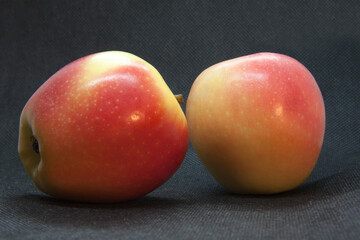 beautiful juicy apples isolated on a black background