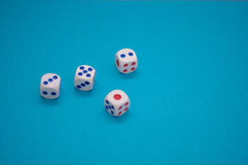 Dice isolated against blue background