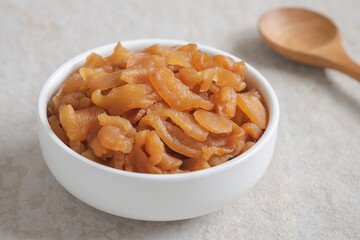 Pickle turnip in white bowl.