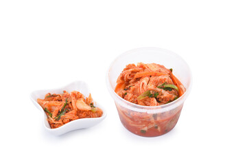 Kimchi cabbage in a bowl on white background