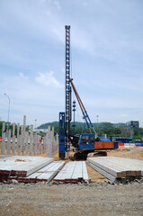 MELAKA, MALAYSIA -SEPTEMBER 18, 2016: Piling machine at the construction site. Handle manually by the workers. 
