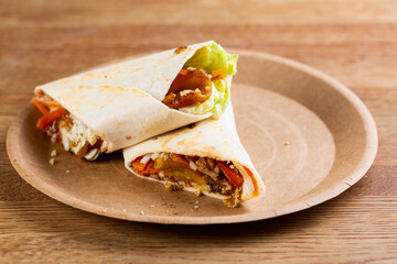 roll with beef patty with fresh vegetables and cheese