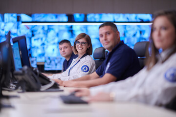 Fototapeta na wymiar Group of Security data center operators at work