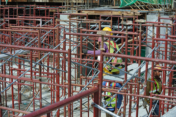 KEDAH, MALAYSIA -AUGUST 05, 2016: Scaffolding used as the temporary structure to support platform, form work and structure at the construction site. Also used it as a walking platform for workers. 