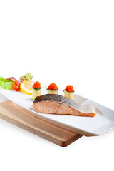 Tuna steamed isolated white background. Tuna Steak with ulek chili topping wrapped in thinly sliced cucumbers, lettuce, cherry tomato slices, and lemon slices are served on a white plate.