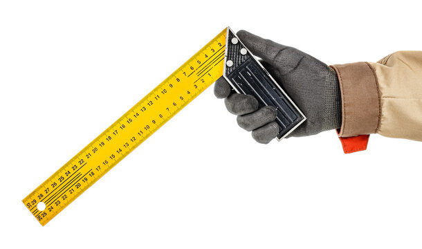 Carpenter metal square ruler in worker hand in black protective glove and brown uniform isolated on white background