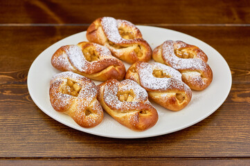 A plate of food on a wooden table