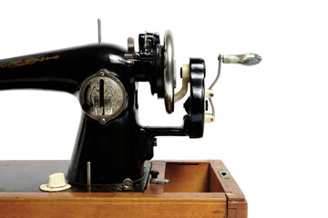 Old, retro vintage sewing machine on a white background.