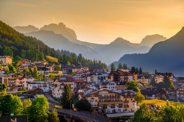 Fototapeta na wymiar Countryside view ,Dolomites mountains in background, Italy, Europe