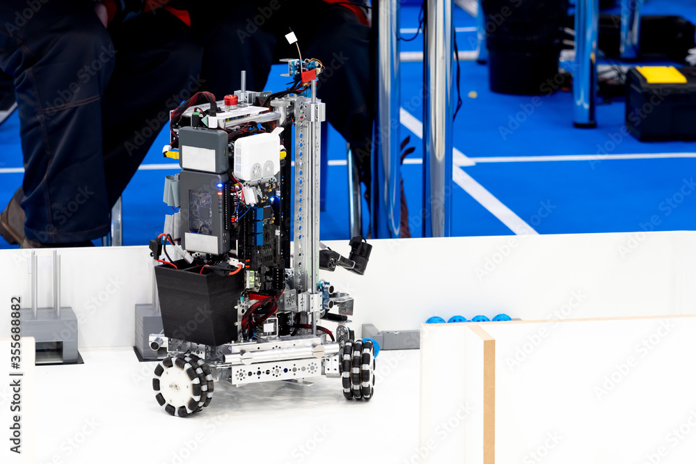 Poster robotics. demonstration of the robot. programmable robot on a wh