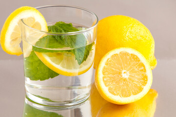 glass of lemonade.  Fresh lemon with Fresh mint on water 