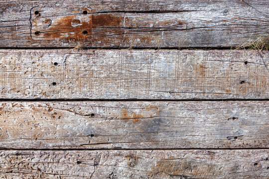 Old brown weathered distressed wood oak timber planks background stock photo