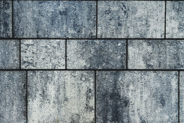 in Reihen verlegtes nasses Beton Pflaster von Oben