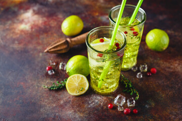 Lime Lemonade with thyme, cranberry and ice.