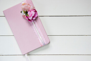 notebook with rose