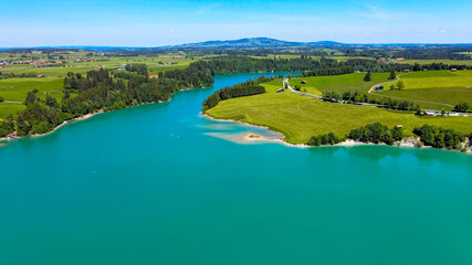 Aerial view over Lake Forggensee at the city of Fuessen in Bavaria Germany