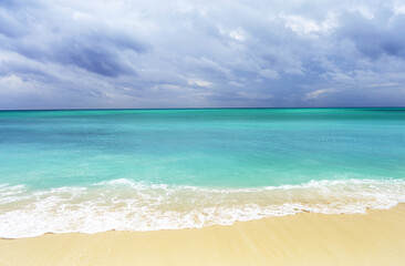 Beautiful sea wave and white sand beach Zanzibar, Tanzania.