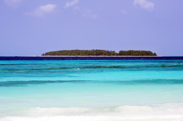 Tropical beach and blue ocean in paradise island
