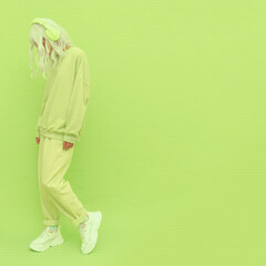 Fashion Dj Girl in Fresh yellow clothing. Minimal aesthetic monochrome design.