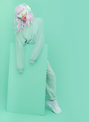 Dj Girl in Fresh Mint Fashion Look. Minimal aesthetic monochrome design. Aqua menthe color trend