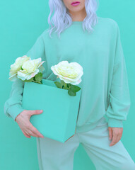 Fashion Lady in Fresh Mint clothing. Minimal aesthetic monochrome design. Aqua menthe color trend