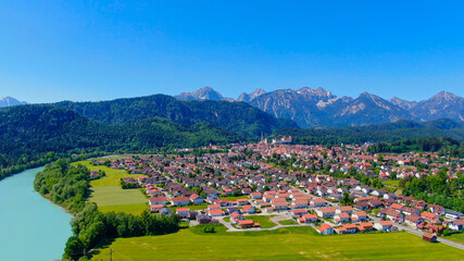 Fototapeta na wymiar Aerial view over the city of Fuessen in Bavaria, Germany - home of the famous Bavarian King Ludwig Castles
