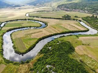 Aerial view of river Lika meandering through Donji Kosinj and Lipovo Polje villages in Croatia.