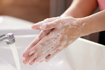 Global Handwashing Day Concept/Washing of hands with soap in bathroom. Global Handwashing Day...