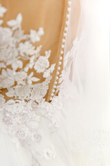 lace wedding dress with buttons back view