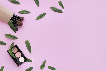 Healthy vegan decorative cosmetic for make up on pink background. Eye shadow, highlighter, blush. Conscious consumption.