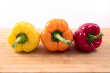 yellow, oran  and red peppers