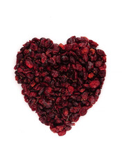 Fototapeta na wymiar Organic dried cherries in heart symbol isolated on white background
