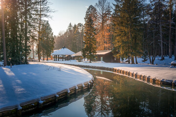 Brdo estate venue for diplomatic meetings and other Government-sponsored events. Winter season. Landscape covered with snow. Beautiful pond full of fish