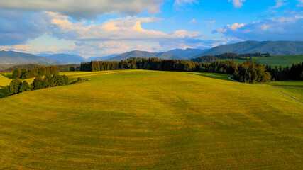 Flight over the beautiful rural landscape of Bavaria Allgau in the German Alps. Aerial view